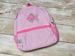 Pink seersucker backpack with Fish